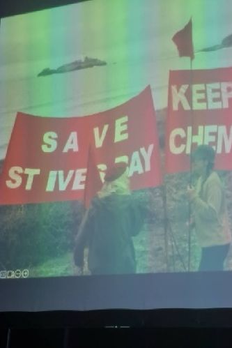 Basel, October 2023. Save St Ives Day / Keep Our Sea Chemical Free. Harun Morrison (artist in residence at greenpeace) and Therese Keogh (artist and activist) shared this image from a greenpeace protest during a conversation on sites of environmental and social offshore-ness. Harun and Therese told us about recent attempts to halt a geo-engineering project in St. Ives Bay, Cornwall. In the image the protestors are watching as a Canadian company called Planetary Technologies, backed by Elon Musk, run a large scale experiment on Ocean Alkalinity Enhancement in the bay, a technique using large mounts of chemicals to increase the ability of seawater to absorb Co2. The tests lead to investment by Frontier Climate - a payment infrastructure owned by Stripe, allowing future purchase of carbon removal tonnes by Planetary Technology. Stripe become members setting the standard for Carbon Removal credits on the EU Carbon Expert committee. This large scaled unoptimised experimentation is what the digital and green transition looks like according to Big Tech.