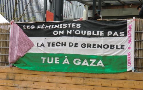 Grenoble, March 2025. On the outside of the temporary open air kitchen, this banner: Feminists do not forget / Tech made in Grenoble / Kills in Gaza / Queers 4 Palestine. Three days of action against the extension of a chip factory include the work of bringing together local and global struggles. Using all means possible, activist make an effort at solidarity on multiple scales. It included preparing over a thousand vegan sandwiches to take with us on the march.